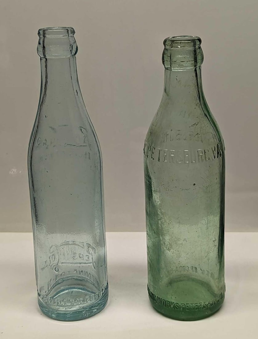 Vintage Coca-Cola And Pepsi Cola Glass Bottles: Vintage Coca-Cola And Pepsi Cola Glass Bottles. This lot includes: (1) Vintage Pepsi Cola Glass Bottle. From Wilmington, NC. This is approx 2 1/2" x 2 1/2" x 8 1/4". The bottle has some s