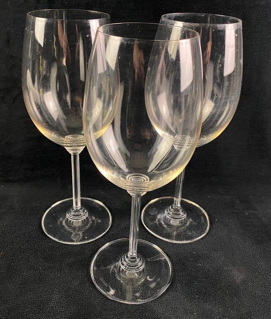 Three Riedel Red Wine Glasses: Three Riedel Red Wine Glasses For 300 years Riedel has been a leader in European crystal stemware, and this set of merlot/cabernet glasses is no exception. The stem shape evokes the columns of ancient