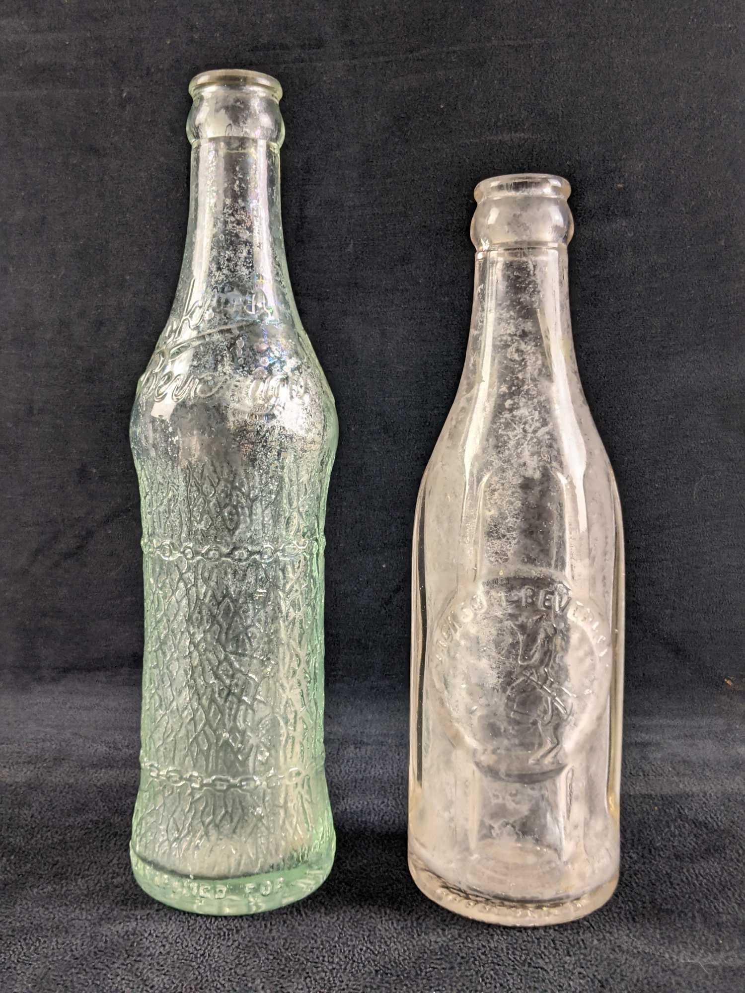 Vintage Jackson Beverages Soda Bottles: Vintage Jackson Beverages Soda Bottles These soda bottles held Jackson Beverage Root Beer long ago. These bottles don't have any cracks or chips, they just may be foggy from age. 8in tall and 9 1/