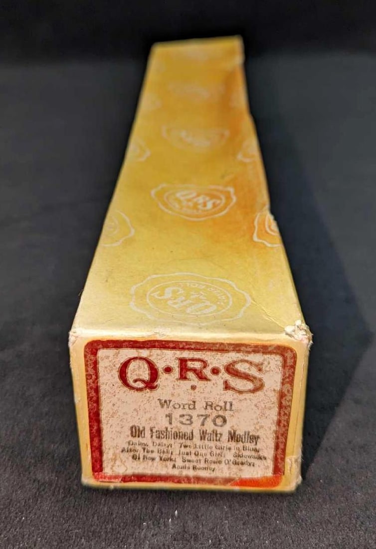 QRS Word Roll Player Piano Old Fashioned Waltz Medley: QRS Word Roll Player Piano Old Fashioned Waltz Medley. #1370. Comes in its original box that is approx 2 1/4" x 2" x 12 1/2" and it weighs 0.56lb. The box has some shelf wear.