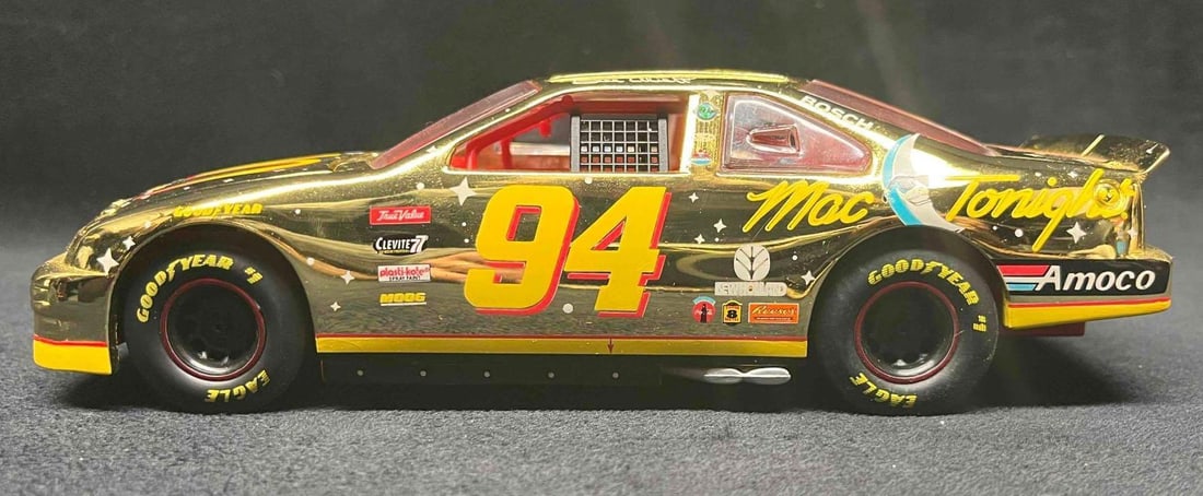 1998 Racing Champions Gold Die Cast Car Bill Elliot Mac Tonight: This lot contains a 1998 Racing Champions Gold Die Cast Car Bill Elliot Mac Tonight. It is approx 7 3/4" x 2 3/4" x 2 3/4" and weighs about 1.4lbs. Overall the Car is in good used conditio