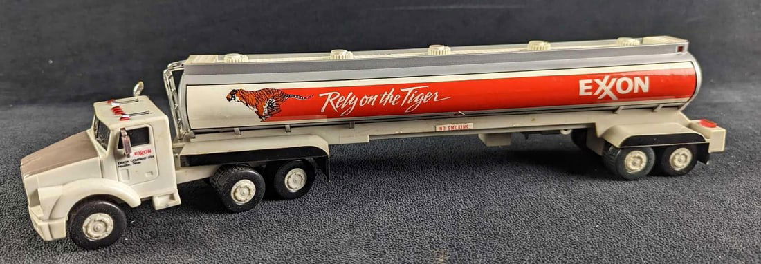 Exxon Rely On The Tiger Toy Tanker Truck: Exxon Rely On The Tiger Toy Tanker Truck. Is approx 14" x 2 1/2" x 3". It comes in its original box which is approx 15 1/4" x 3 1/4" x 7" and it weighs 1lb. The box has some sh