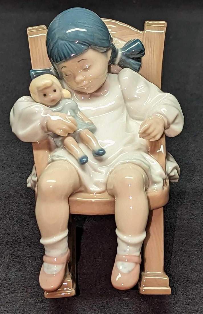 Retired Lladro Naptime Little Girl Figurine: Retired Lladro Naptime Little Girl Figurine. This was designed by JosÃ© Puche and was released from the year 1987 to the year 2004. The figurine is approximately 3" x 4" x 4 1/2" and it 