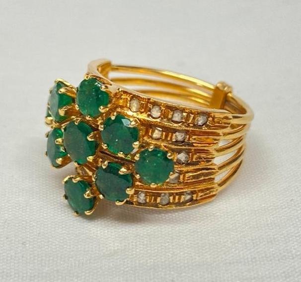 14k Gold Emerald Multi Stack Ring: 14k Gold Emerald Multi Stack Ring This piece of fine vintage Jewelry has been tested and researched prior to listing. Please view all our pictures prior to bidding,they are part of the description.