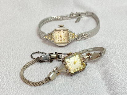 Two Vintage Bulova Ladies Watches: This piece of jewelry has been tested and researched prior to testing . Please view all our pictures they are part of our description. DETAILS: Metal - Gold plated base metal Color - silver Stones -