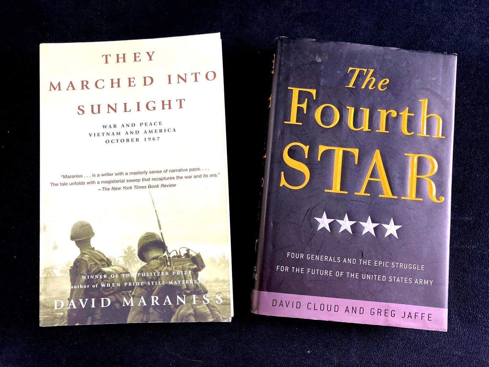 Set of (2) Military History Books They Marched Into Sunlight & The Fourth Star: This lot includes: (1) They Marched Into Sunlight by David Maraniss (1) The Fourth Star by David Cloud Condition is used and see photographs for additional details.