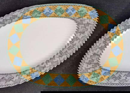 Retired Castillo By Noritake Oval Serving Platter: Castillo By Noritake Fine China Oval Serving Platter. Was released from 1996 - 2000. Is approx 16" x 11" x 1" and is a good, used cognition with no known damage.