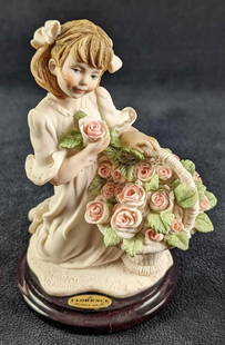 Giuseppe Armani Cherie Girl & Flowers Figurine: Giuseppe Armani Cherie Girl &amp; Flowers Figurine  Open Edition &#34;Cherie&#34; Giuseppe Armani Figurine. The figurine is made of Capodimonte porcelain and is approx 3 1/2&#34; x 3 1/4&#34; x 5 1/8&