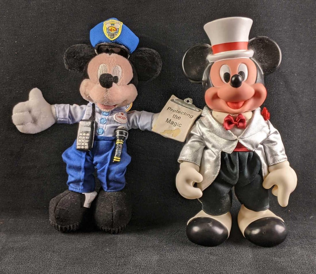 Disney Mickey Mouse Dolls: Disney Mickey Mouse Dolls This lot comes with two Micky mouse dolls. both are in good condition with some minor flaws. Cast Member Collection Security Mickey, some pealing damage on his clipboard. Ha