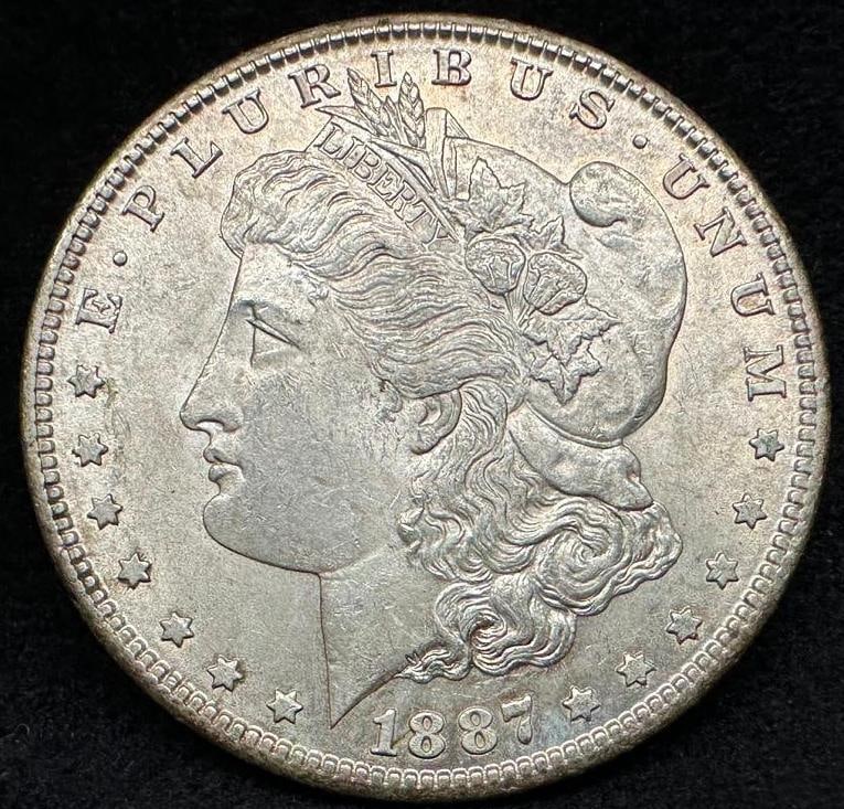 1887 S Morgan Silver Dollar Unc (1 of 2)