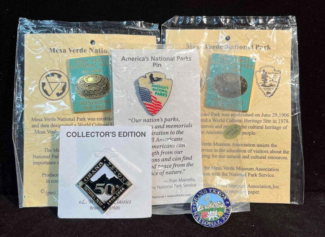 Bundle Of National Parks Enamel Pins (F18): This lot contains a Bundle Of National Parks Enamel Pins (F18). The pins fit together in a 6 1/4" x 7" plastic bag and altogether they weigh about 0.1lbs. Overall the pins were in good used co