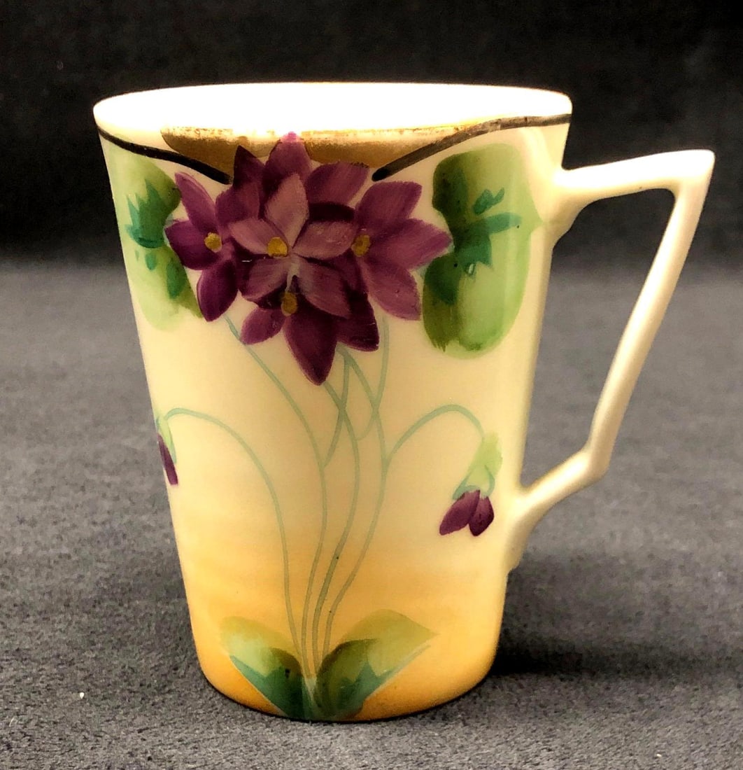 Antique Te-Oh Nippon China "Violets" Lemonade Cup: Antique Te-Oh Nippon China - Hand Painted "Violets" Lemonade Cup. Nippon pottery was made in Japan between 1891 and 1921. The Antique Cup is approximately 4" x 3-3/4" x 2-3/4" and