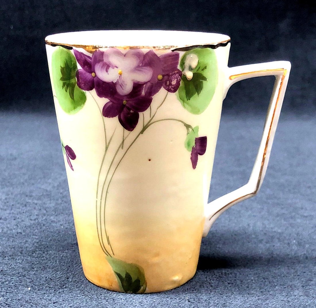 Antique Te-Oh Nippon China "Violets" Lemonade Cup: Antique Te-Oh Nippon China - Hand Painted "Violets" Lemonade Cup. Nippon pottery was made in Japan between 1891 and 1921. The Antique Cup is approximately 4" x 3-3/4" x 2-3/4" and