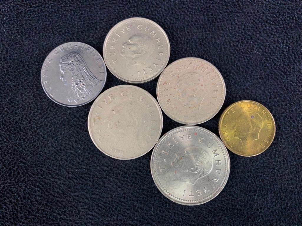 Lot of Turkish Coins: Lot of Turkish Coins 6 coins from Turkey from various years and in various denominations. Coins are in varying condition, see photos for best description. Approximate size: 2" x 2" x 0.5" 