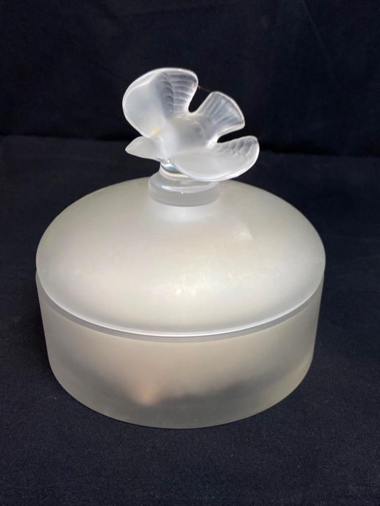 Lalique Nina Ricci Powder Jar Frosted Crystal: Lalique Nina Ricci Powder Jar Frosted Crystal This vintage powder jar for Nina Ricci was made by Lalique in their signature frosted French crystal. The jar features a domed lid with the handle in the 