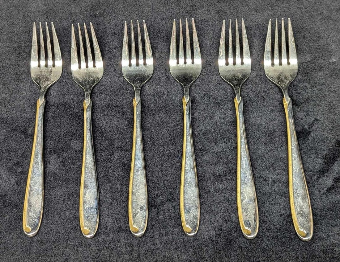 6 Retired Mikasa Estasi Stainless Dinner Forks: 6 Retired Mikasa Estasi Stainless Dinner Forks. This series was released from 1982 - 2004. Each fork is approx 7 3/8" and together they weigh 0.73lb. Made in Japan. The stainless steel forks are i