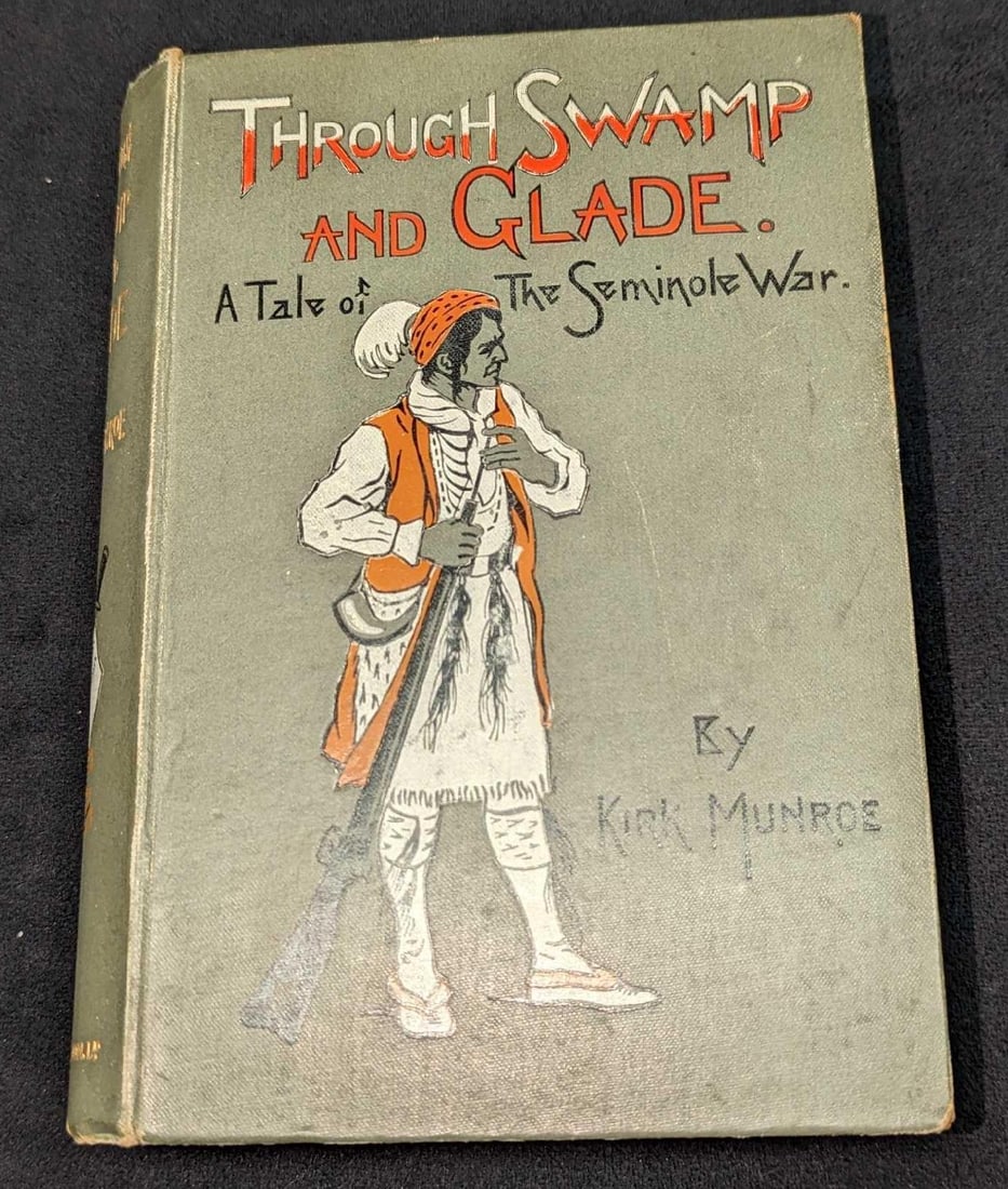 Through Swamp And Glade By Kirk Munroe Hardcover: Through Swamp And Glade By Kirk Munroe Hardcover. This was published by Blackie & Son (London) in 1897. The hardcover is approx 5 1/2" x 1 3/4" x 7 1/2" and it weighs 1.58lb. The book 