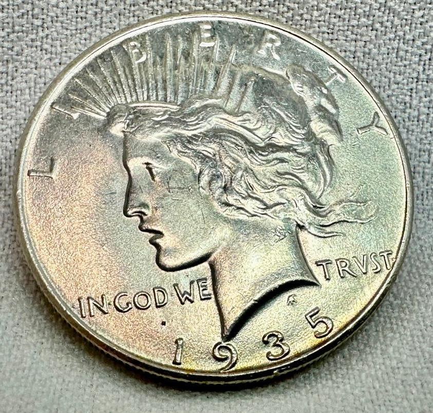 1935 P Peace Dollar AU/XF: These coins have been tested and researched to the best of our ability prior to listing. Please view photos, as they are a part of the condition. DETAILS: Metal - .900 Silver Tested - Yes Size - 1.5&#