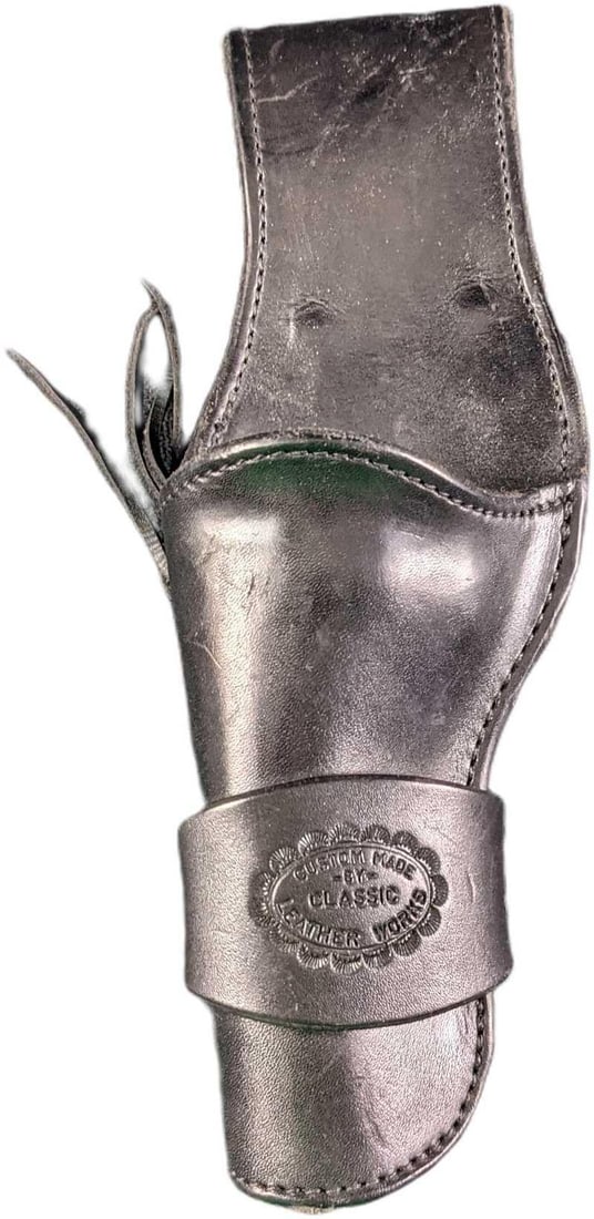 Leather Custom Made Classic Leather Works Revolver Holster: Leather Custom Made Classic Leather Works Revolver Holster. Is approx 3 1/2" x 2" x 11" and it weighs under one pound at 0.62lb. The holster is in a good, used condition some wear inside. 
