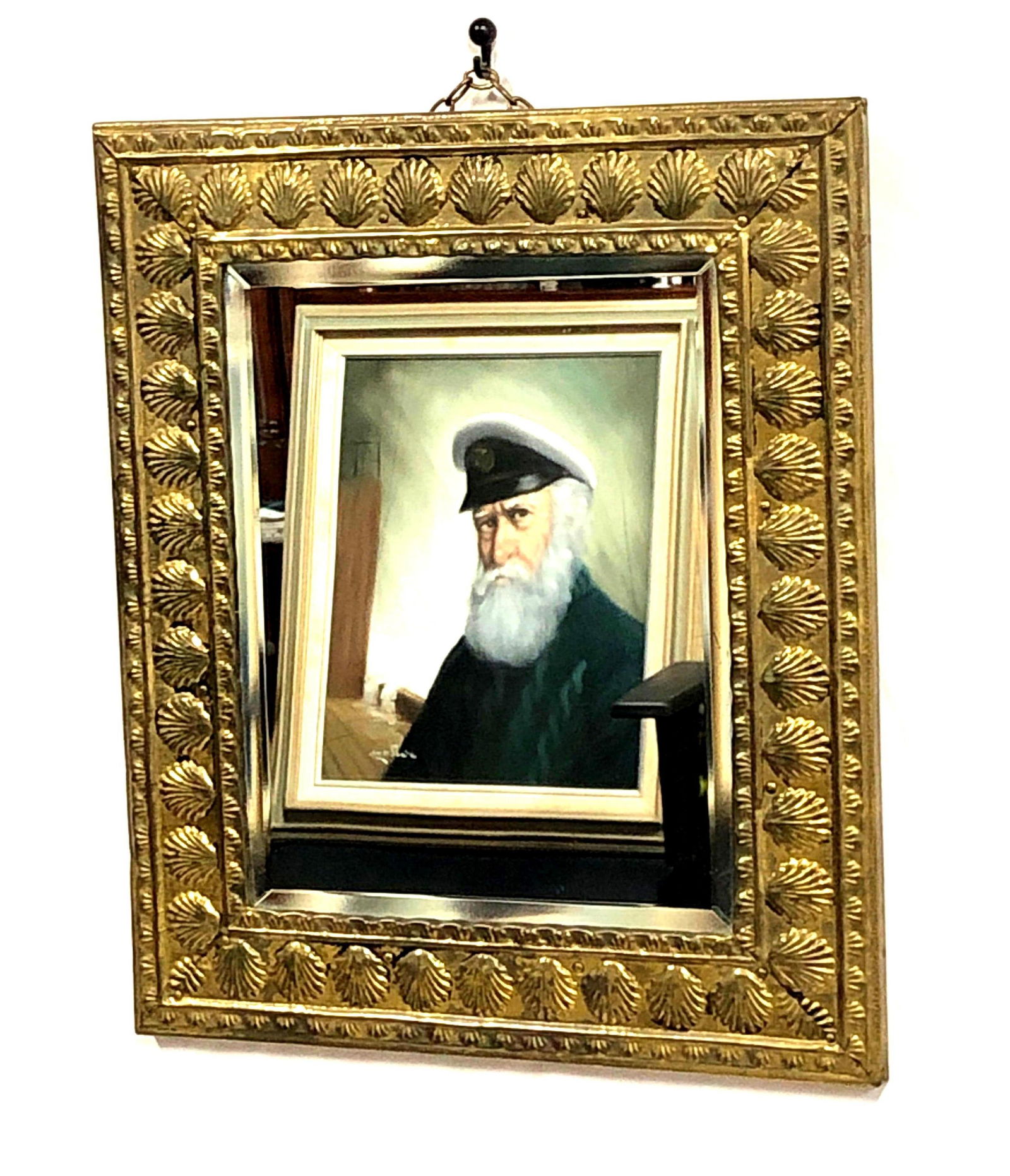 Antique 1930's Brass Seashell Beveled Mirror: Antique 1930's Brass Seashell Beveled Mirror with Chain to Hang. The Antique Mirror is approximately 11-3/4" x 13-3/4" x 1/2" and it weighs about 3.0lbs. Overall the Brass Mirror is in