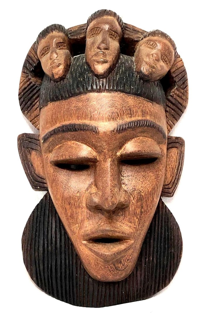 Handmade African Carved Wood Tribal Mask: Handmade African Carved Wood Mask. Item does not have a hook for hanging on wall. The mask is approximately 11-1/2" x 6" x 2-1/2" and weighs about 1.0lbs. Overall the Handmade Mask is in g