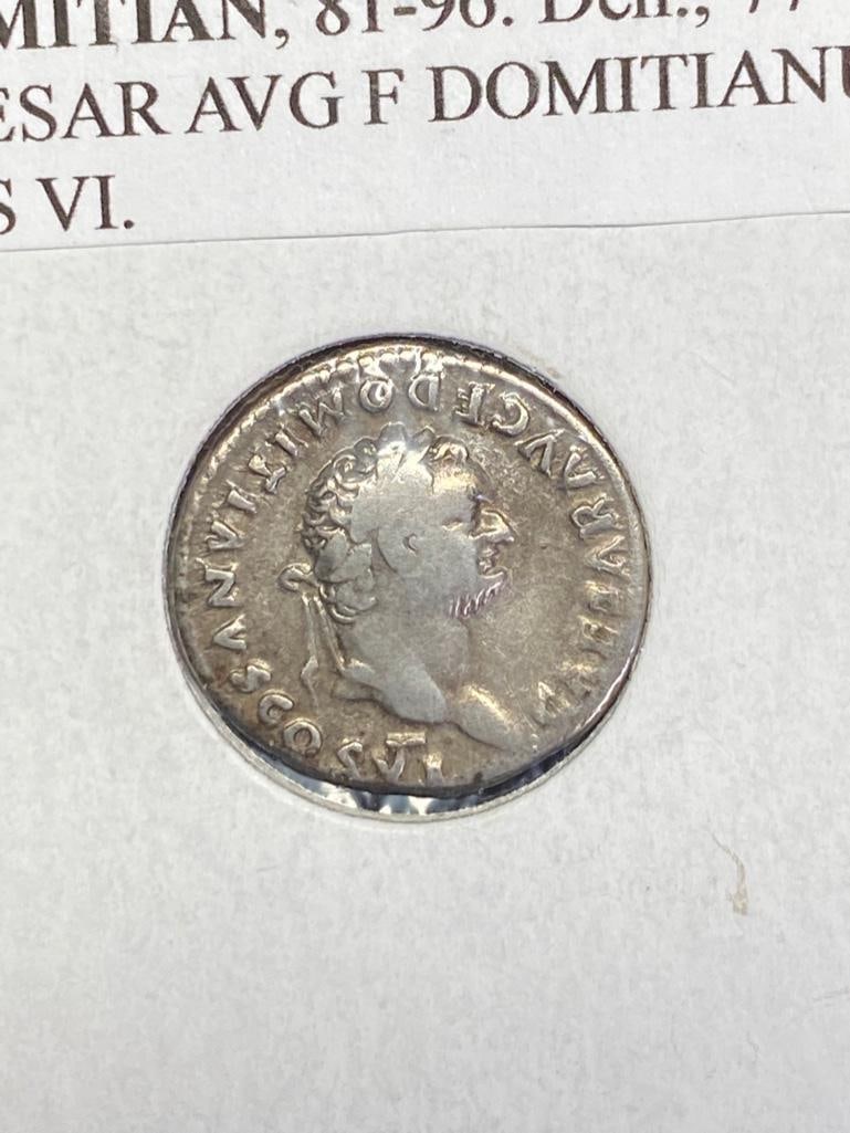 Roman Denarius RIC II, Part 1 Vespasian 1084: Ancient Roman denarius Vespasian 1084 Date Range: 79 AD Material: Silver Obverse: CAESAR AVG F DOMITIANVS COS VI Reverse: PRINCEPS IVVENTVTIS Mint: Rome