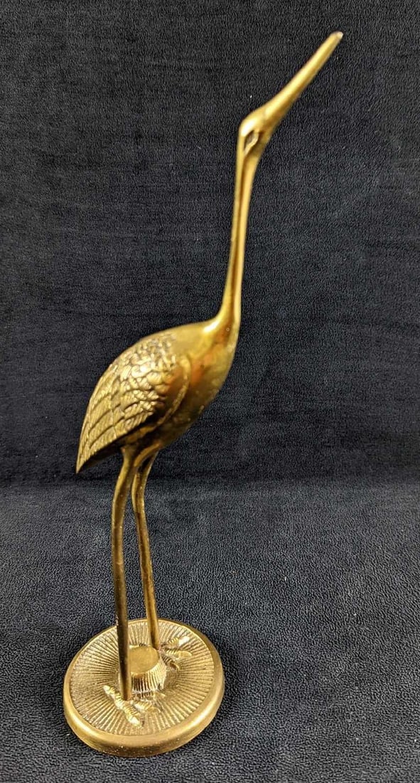 Vintage Brass Crane Looking Up: Vintage Brass Crane Looking Up. The maker and date of creation are unknown. Is approx 5" x 3" x 12" and it weighs 0.75lb. The crane is in a good, vintage condition with some surface tarnis