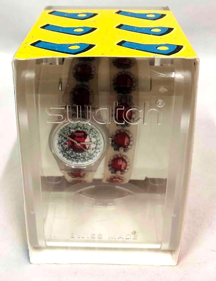 Unopened Hits Hots Swatch: This lot contains a Unopened Hits Hots Swatch. The case is approx. 2 1/2" x 3 3/4" x 3 3/4" and together the case and watch weigh about 0.2lbs. Overall the watch is in excellent used condi