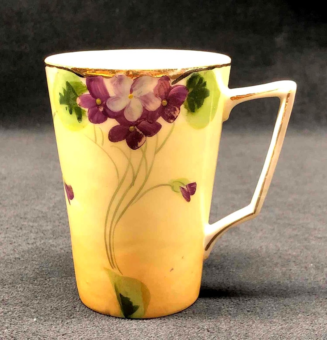 Antique Te-Oh Nippon China "Violets" Lemonade Cup: Antique Te-Oh Nippon China - Hand Painted "Violets" Lemonade Cup. Nippon pottery was made in Japan between 1891 and 1921. The Antique Cup is approximately 4" x 3-3/4" x 2-3/4" and