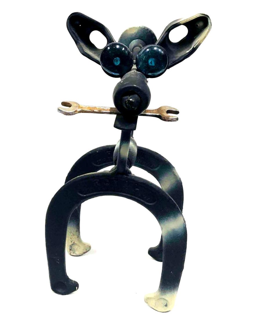 Steel/Iron Folk Art Dog Sculpture Wrench As Bone: This lot contains a Steel/Iron Folk Art Dog Sculpture With A wrench as a bone. It is approx 14" x 7" x 15" and it weighs about 7lbs. Overall the Dog Sculpture is in good used condition wit