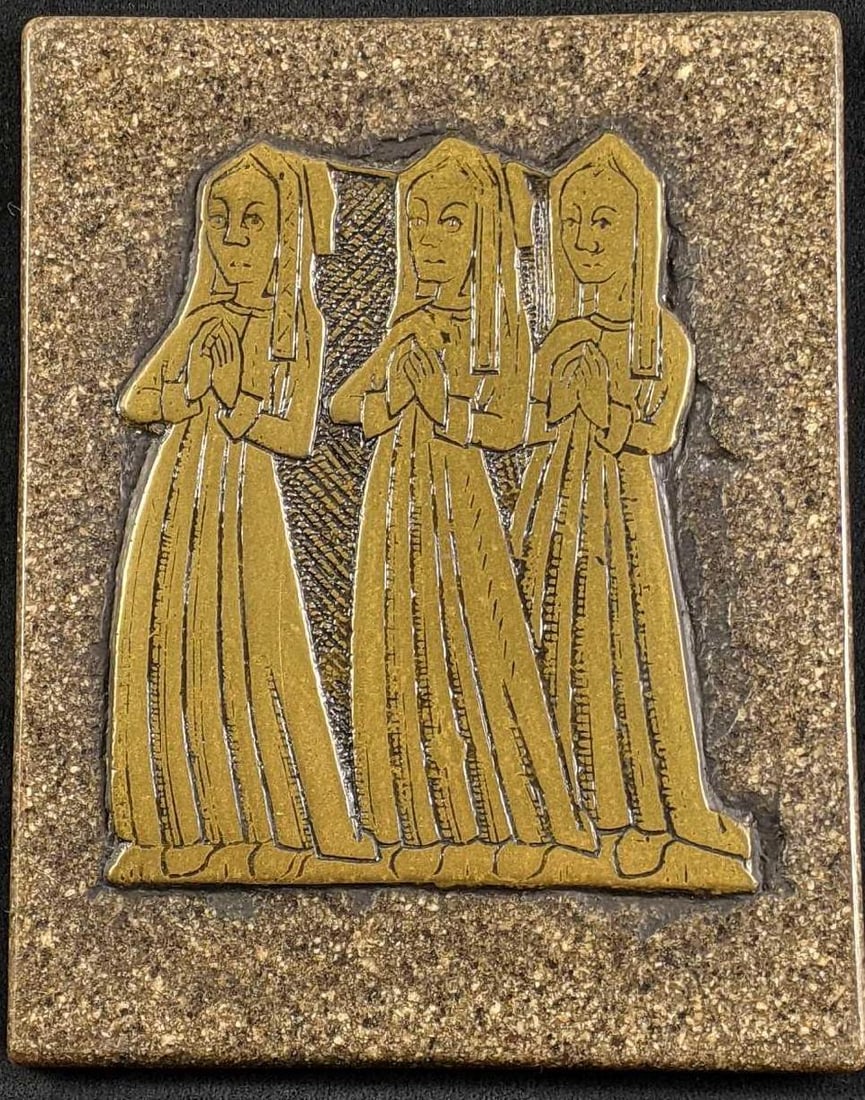Brass Plate Granite Praying Nuns: Brass Plate Granite Praying Nuns This is a brass plate mounted on synthetic granite. This wall decoration has a chain on the back to be hung from. There is no known damage. In used good condition. 9