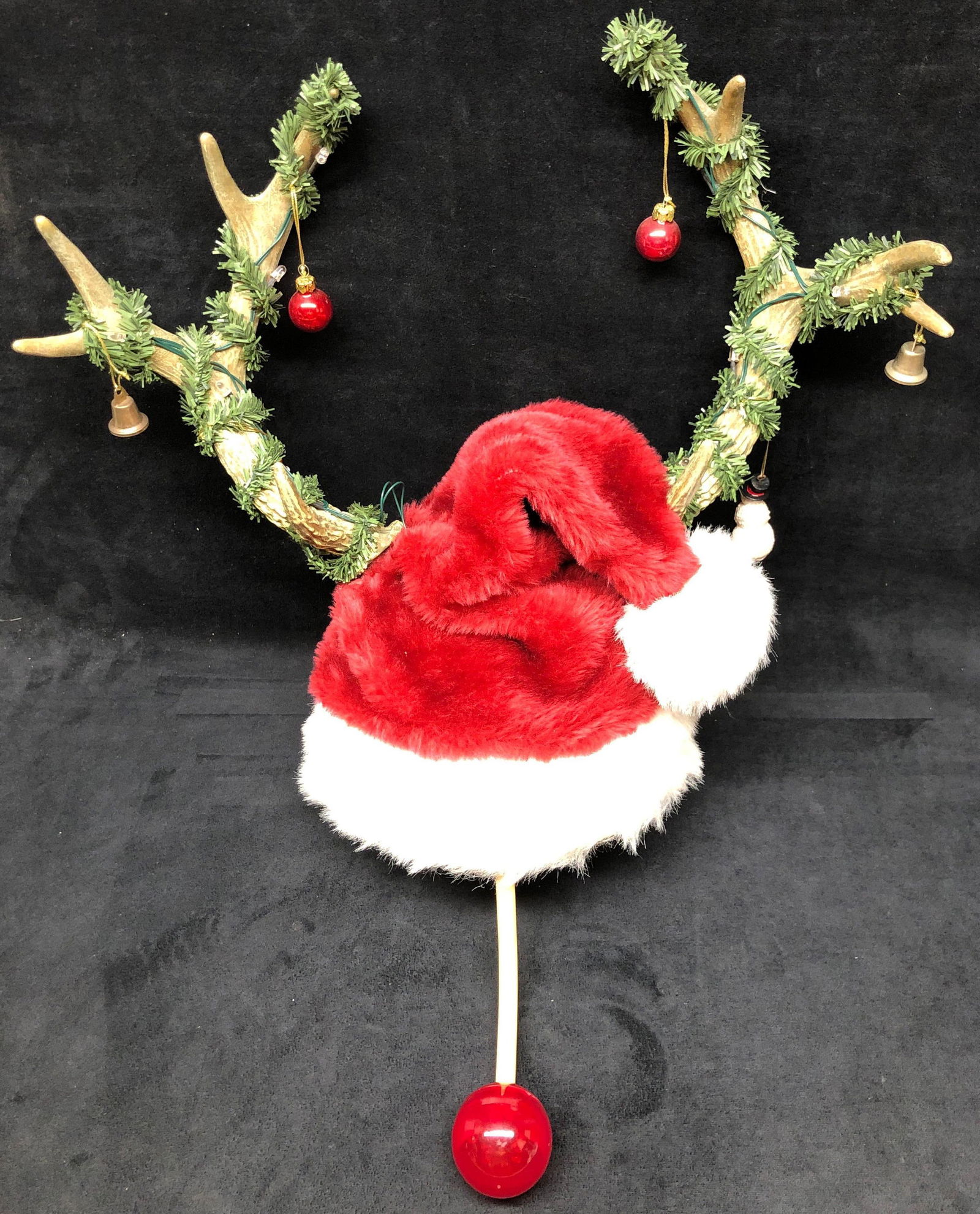 Vintage Rudolph the Red Nosed Reindeer Santa Hat: This lot contains Vintage Rudolph the Red Nose Reindeer Santa Claus Hat. It is approx 22" x 18" x 12" and weighs about 1.3lbs. Overall the Vintage Holiday Hat is in good used condition wit