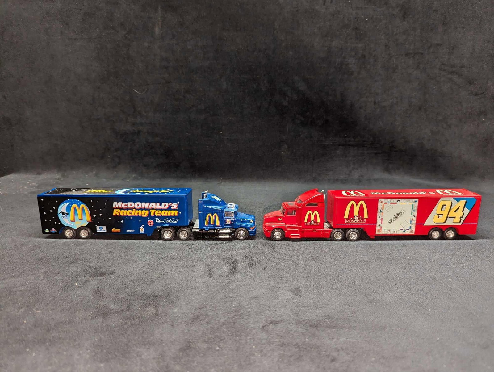 2 Racing Champions Transport McDonalds Die Cast: 2 Racing Champions Transport McDonalds Die Cast. This lot includes: (1) Racing Champions Mac Tonight Bill Elliott McDonalds Racing Transport. This is approx 2" x 11 1/2" x 2 3/8" and it we