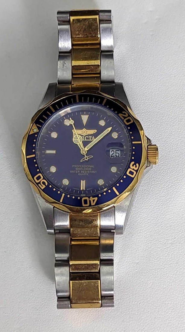 Invicta 8935 Men's Stainless Steel Watch: Invicta 8935 Men's Stainless Steel Watch. DETAILS: Manufacturer - Invicta Model - 8935 A Movement - Quartz Case - Stainless Steel - 37.5mm Bracelet - Stainless Steel Features - Luminous Hands, Sh