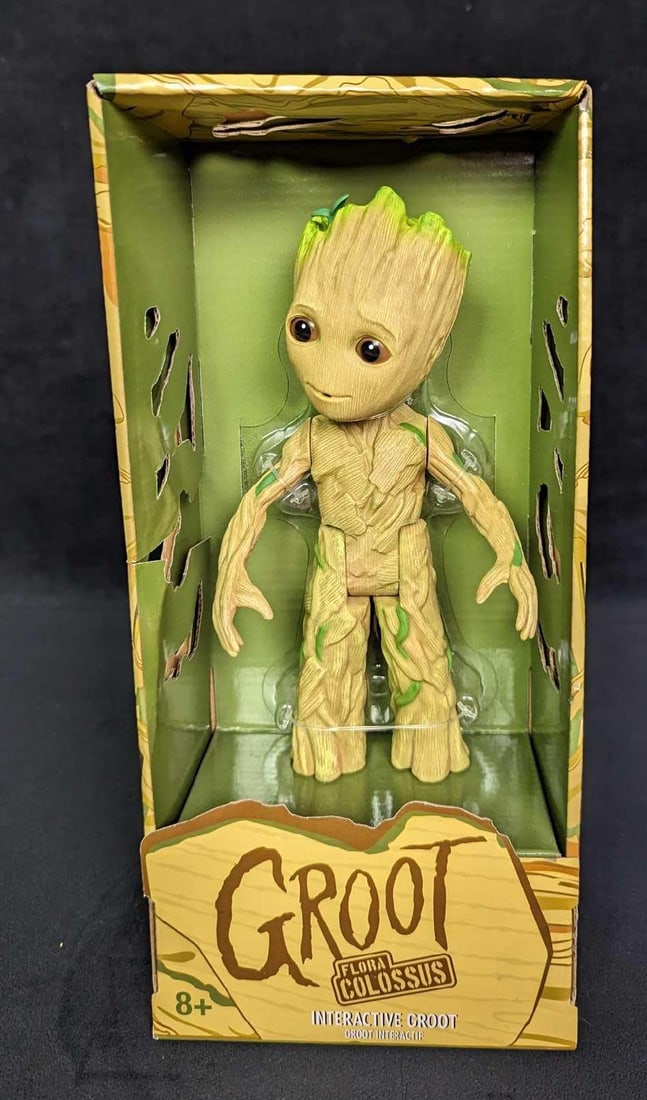 Disney Marvel Groot Interactive Robot B: Disney Marvel Groot Interactive Robot B. Interactive plastic Groot recognizes and responds back to 20 spoken phrases with sounds, music and movement. Articulated arms and legs with motorized legs and 