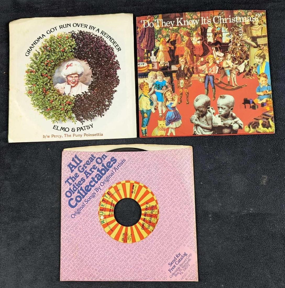 3 Grandma Got Ran Over By A Reindeer Feed The World Grass Roots 7" Singles: This lot includes: (1) Band Aid – Do They Know It's Christmas? This was released by Columbia in 1984. (1) The Grass Roots - Temptation Eyes/Come On And Say It. This was released by Roulette Reco