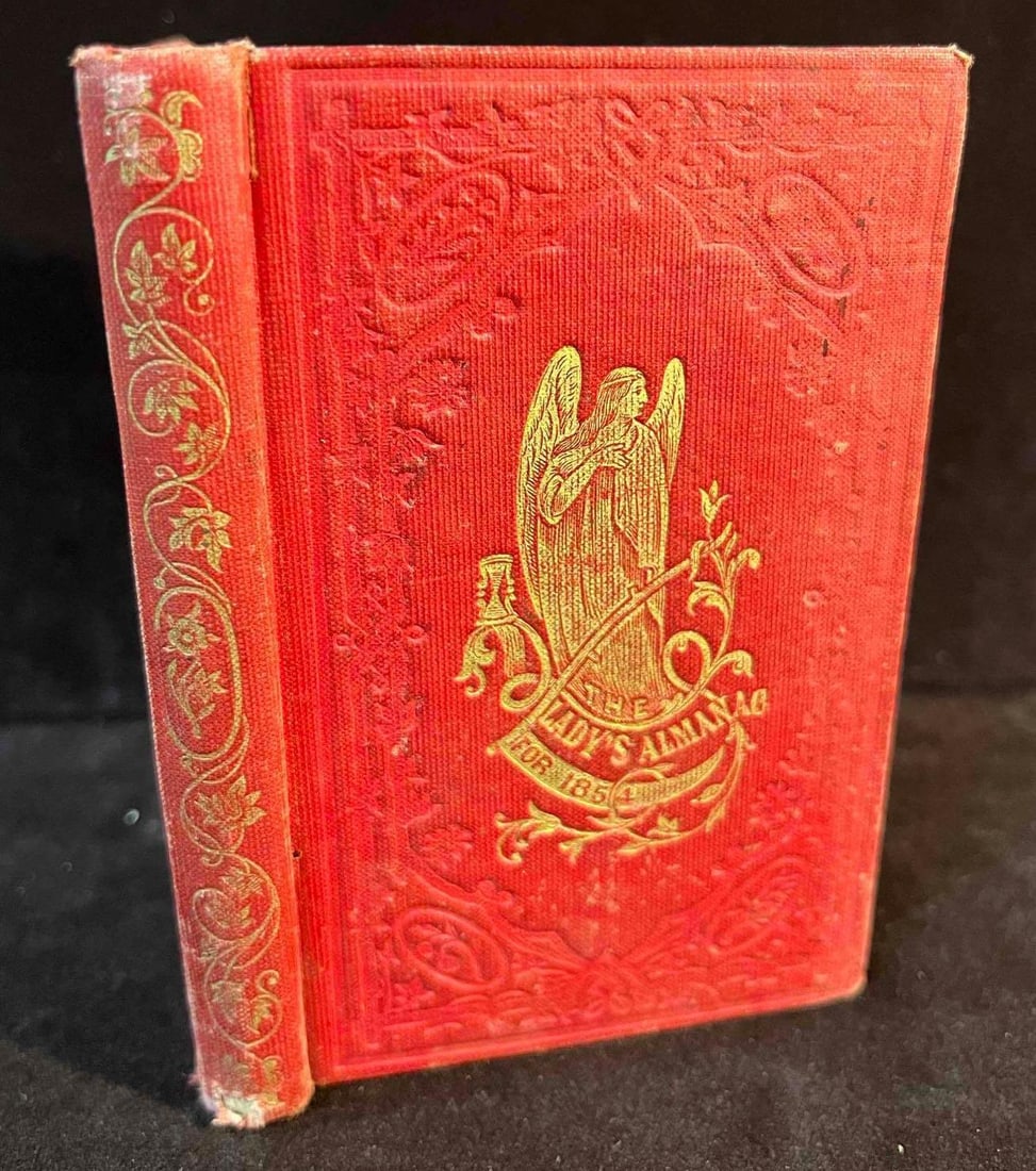 Hardcover Copy Of The Lady's Almanac For 1854 By Damrell & Moore & G. Coolidge: This lot contains a Hardcover Copy Of The Lady's Almanac For 1854 By Damrell & Moore & G. Coolidge. Published By Boston: John P. Jewett & Co. It is approx 4 1/2" x 3" and it we