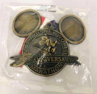 Six Sealed Walt Disney World 5th Anniversary Marathon Medals January 11th 1998: This lot contains Six Sealed Walt Disney World 5th Anniversary Marathon Medals January 11th 1998. Presented by Foot Locker. Made in Taiwan. Each Medal is approx 3 3/4" x 4 1/4" and altogether