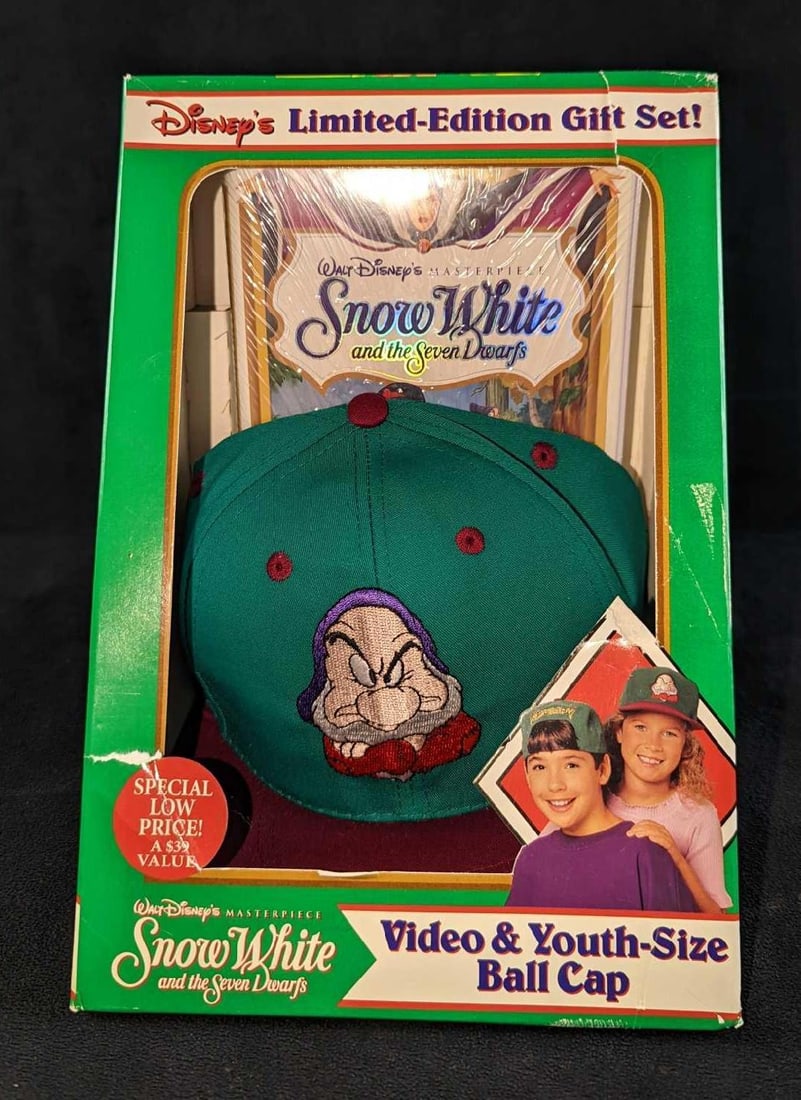 Disney Snow White Cap & VHS Movie Collector Set: This special "Limited Edition Gift Set" comes with a youth-sized "Grumpy" hat (fits kids ages 4-12) along with a sealed video cassette of the classic animated movie. The set is approx