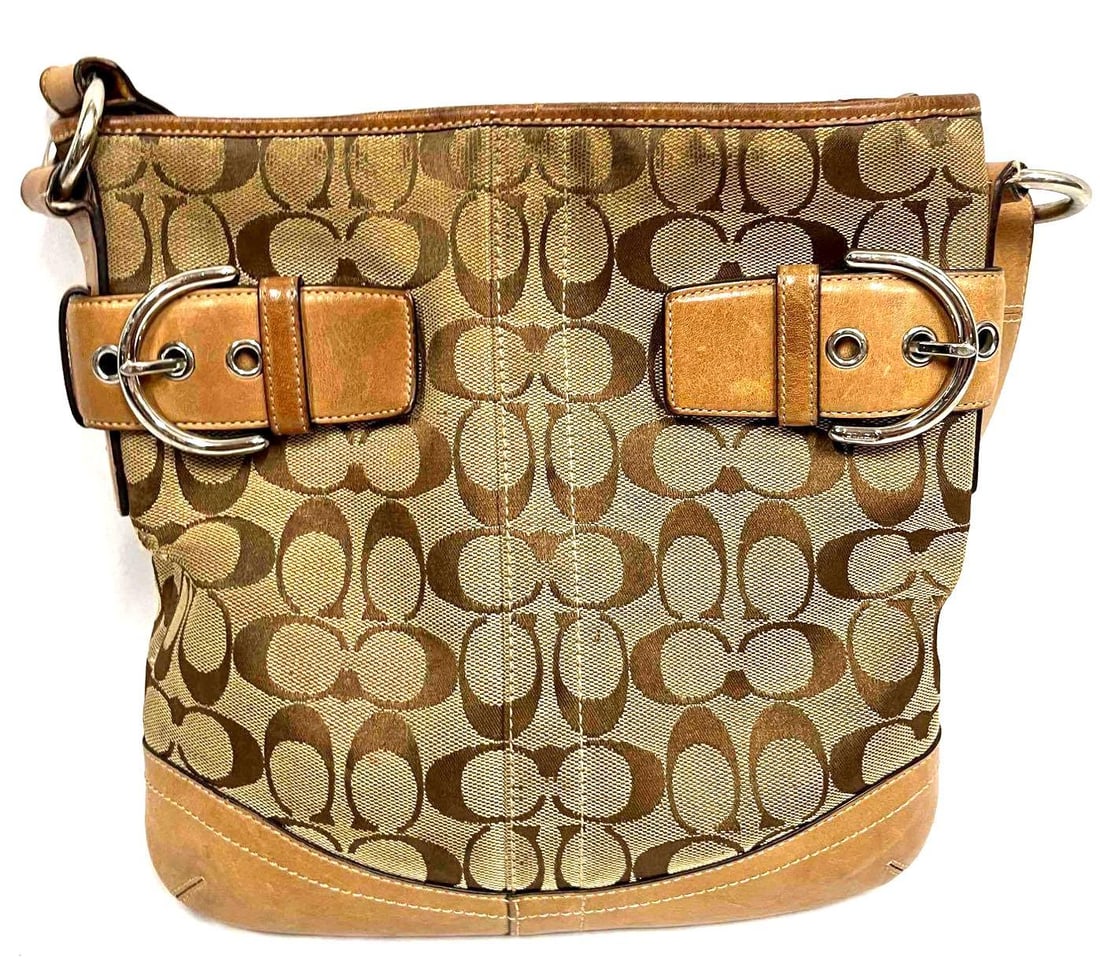 Vintage Coach Bag No.MO5W-3574 Crossbody: This lot contains a Vintage Coach No.MO5W-3574 Crossbody Bag. The bag is approx 11 1/2" x 1 1/2" x 11" and it weighs about 1.2lbs. Hand Crafted in China. Overall the Vintage Coach bag in g