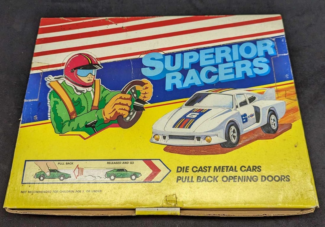 Superior Racers Box Of 12 With Original Box: Superior Racers Box Of 12 With Original Box. Die-cast metal cars. Pull back, release and they go! The box is approx 14 3/4" x 11 1/4" x 1 1/2" and it weighs 3.30lbs. The box has some shelf
