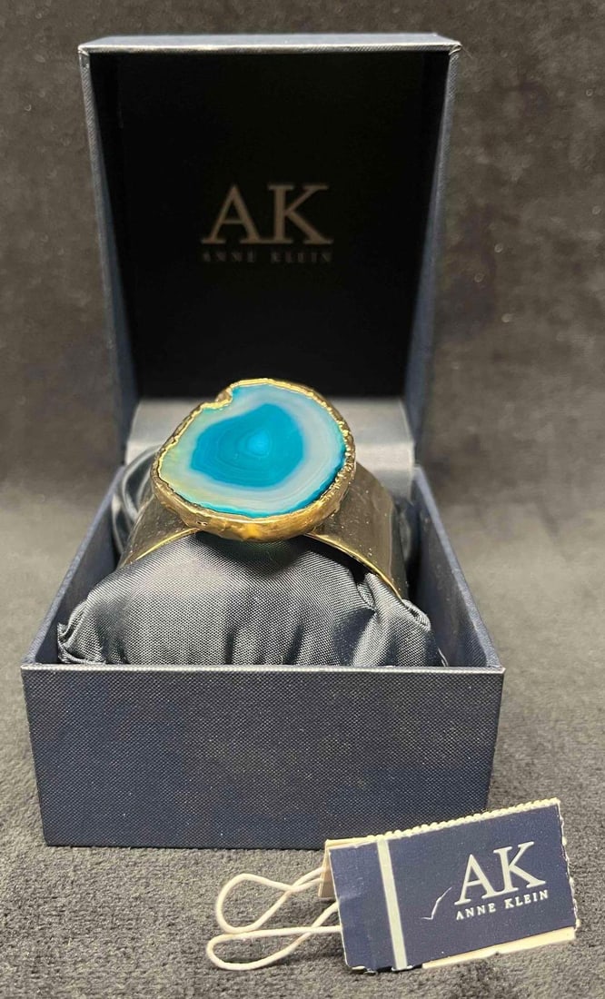 Anne Klein Bracelet New In Box: This lot contains a Anne Klein Bracelet New In Box. The bracelet fits a small/medium wrist and the box is approx 3 1/4" x 3 3/4" x 2 3/4" and it weighs about 0.4lbs. Made in China. Overall