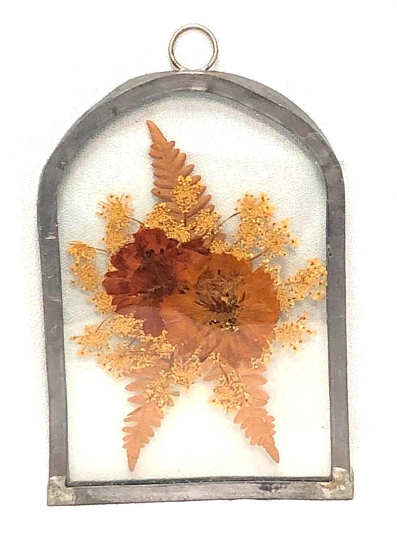 VTG Pressed Floral Foliage Leaded Glass Suncatcher: Vintage Pressed Dried Floral & Foliage Leaded Glass Wall Art Suncatcher. It is approx 4-1/4" x 6-1/2" x 1/4" and it weighs about 0.5lbs. Overall the Pressed Flowers Wall Hanging is in