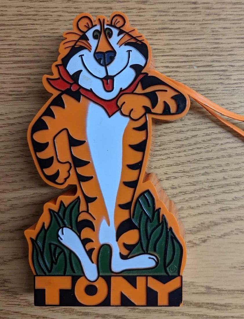 Vintage Tony the Tiger AM Radio: Tony the Tiger AM Radio. Was released in 1980. Requires one 9 Volt Battery (Not included). This radio is approx 3 1/2" x 1 1/2" x 7" and it weighs 0.58lb. Is in good, vintage condition wit
