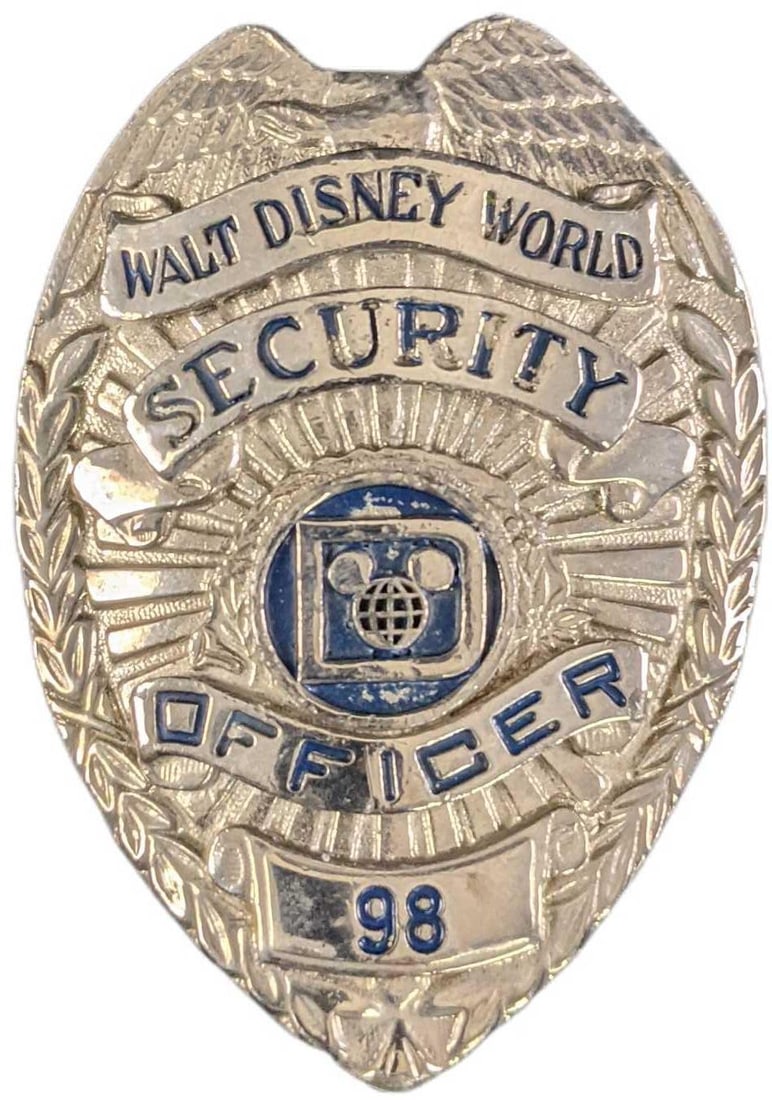 1970s/1980s Disney World Security Metal Badge: 1970s/1980s Disney World Security Metal Badge. Is approx 2 1/4" x 3/4" x 3" and it weighs under one pound at 0.13lb. The metal badge is in a good, vintage condition with some wear, paint l