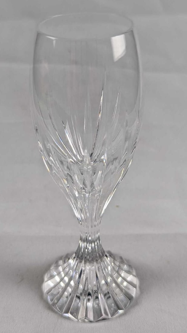 Baccarat Crystal Massena Liqueur Cordial Glass: The Massena glass showcases Baccarat’s meticulous craftsmanship. Deep orgue bevel cuts are etched directly into the clear crystal, radiating from the foot of the glass to the base of the wide bowl. 
