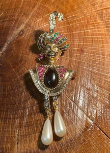 Mary McFadden Jewelry Aladdin Genie Brooch Pin: This lot contains a Mary McFadden Jewelry Aladdin Genie Brooch Pin. It is approx 4 1/4&#34; x 1 3/4&#34; x 1 1/4&#34;. Total weight is approx 1.6oz. Overall the brooch is in good used condition with s