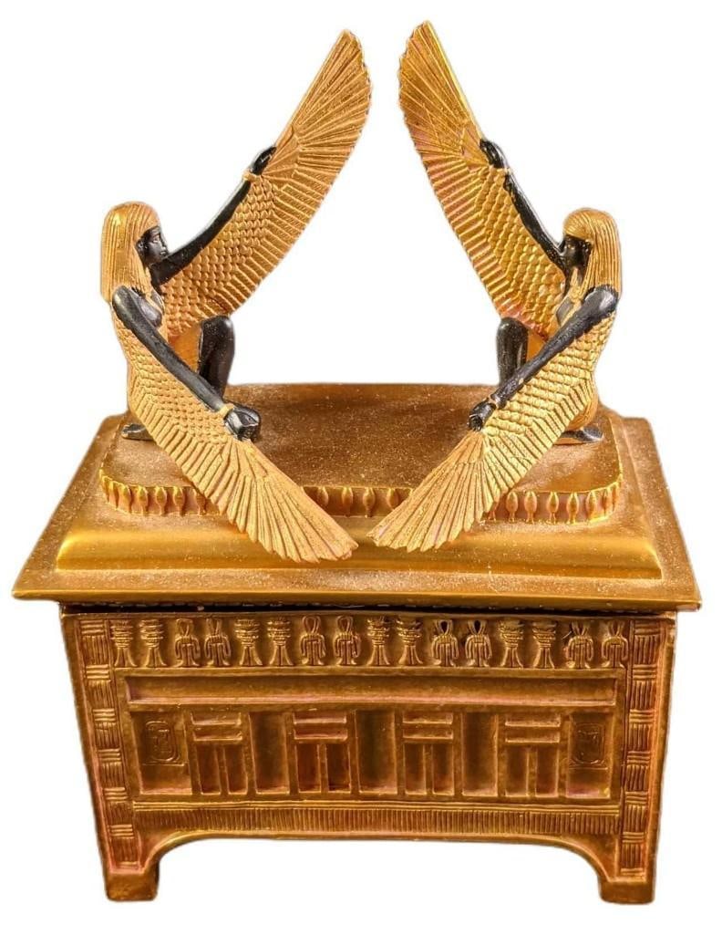 Ark Of The Covenant Trinket Box: Ark Of The Covenant Trinket Box. This is made of hand-painted resin. The maker and date of creation are unknown. Is approx 4 3/4" x 3" x 6 1/2" and it weighs 1.10lb. The trinket box is in 