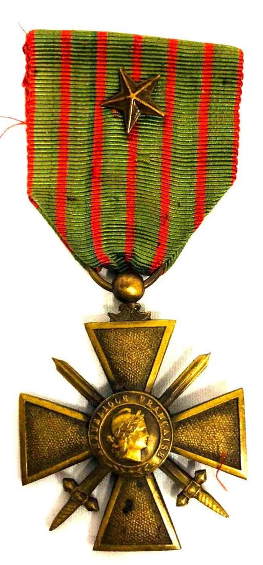Croix De Guerre WWI Medal 1914-1917: The Croix De Guerre medal. This medal was awarded to French and allied soldiers who were cited for bravery during their service in World War 1. Attachments signify degrees awarded based on actions of
