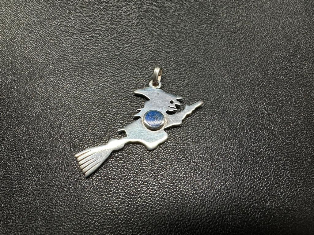 Sterling Lapis Lazuli Witch Pendant: This piece of jewelry has been tested and researched prior to listing. Please view all our pictures they are part of our description. DETAILS: Metal - Sterling Silver Color - Silver Stones - Lapis Laz
